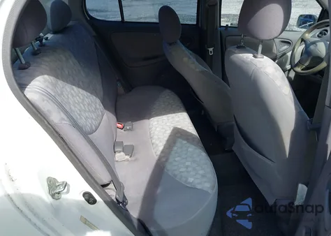 2001 Toyota Echo from USA, damaged, VIN JTDBT123210187482